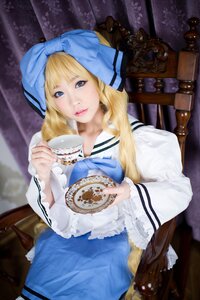 Rating: Safe Score: 0 Tags: 1girl blonde_hair blue_eyes blue_neckwear chair cup hood lips long_hair looking_at_viewer shinku sitting solo table teacup User: admin