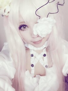 Rating: Safe Score: 0 Tags: 1girl closed_mouth flower kirakishou lips looking_at_viewer purple_eyes smile solo User: admin