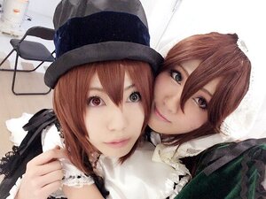 Rating: Safe Score: 0 Tags: 2girls bangs brown_hair hair_between_eyes hat looking_at_viewer multiple_cosplay multiple_girls nishizumi_maho short_hair sisters smile souseiseki tagme twins User: admin