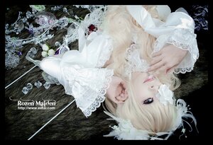 Rating: Safe Score: 0 Tags: 1girl black_background blonde_hair blue_eyes flower kirakishou lace letterboxed lips lolita_fashion long_hair long_sleeves makeup solo upper_body User: admin