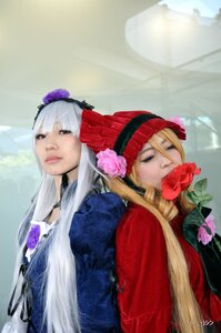 Rating: Safe Score: 0 Tags: 2girls back-to-back blonde_hair bonnet building flower hat lips long_hair looking_at_viewer multiple_cosplay multiple_girls red_eyes rose shinku sisters suigintou tagme upper_body User: admin