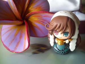 Rating: Safe Score: 0 Tags: 1girl brown_hair chain chibi doll dress heterochromia smile solo suiseiseki User: admin