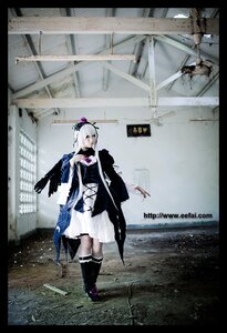 Rating: Safe Score: 0 Tags: 1girl black_border dress gloves gun letterboxed long_hair solo standing suigintou sword thighhighs weapon User: admin