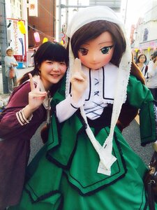 Rating: Safe Score: 0 Tags: black_hair brown_hair city dress green_dress heterochromia long_hair looking_at_viewer multiple_girls smile solo suiseiseki User: admin