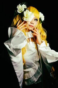Rating: Safe Score: 0 Tags: 1girl black_background blonde_hair flower hair_flower hair_ornament kirakishou lips long_hair long_sleeves realistic see-through simple_background solo white_flower white_rose User: admin