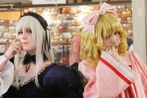 Rating: Safe Score: 0 Tags: 2girls blonde_hair blurry blurry_background chin_rest depth_of_field frills hairband hand_on_own_chin hand_to_own_mouth indoors lips long_sleeves multiple_cosplay multiple_girls photo profile realistic ribbon short_hair silver_hair suigintou tagme upper_body User: admin