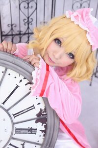 Rating: Safe Score: 0 Tags: 1girl alice_margatroid bangs blonde_hair blue_eyes blurry blurry_background bow day depth_of_field dress hinaichigo lips long_sleeves looking_at_viewer outdoors short_hair sleeves_past_wrists smile solo umbrella upper_body User: admin