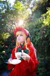 Rating: Safe Score: 0 Tags: 1girl blonde_hair blurry bonnet bow cup dress flower holding long_hair red_dress saucer shinku solo teacup upper_body User: admin