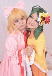 Rating: Safe Score: 0 Tags: 2girls blonde_hair blurry depth_of_field dress flower frills green_eyes green_hair hat holding_hands interlocked_fingers lips multiple_cosplay multiple_girls photo realistic smile striped tagme vertical_stripes wide_sleeves User: admin