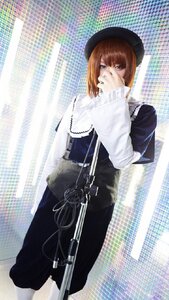 Rating: Safe Score: 0 Tags: 1girl bangs beret brown_hair chain-link_fence dress fence hat long_sleeves looking_at_viewer outdoors skyscraper solo souseiseki standing weapon User: admin