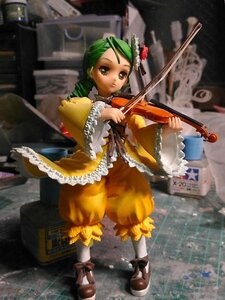 Rating: Safe Score: 0 Tags: 1girl doll dress frills green_hair hair_ornament instrument kanaria solo standing white_legwear User: admin