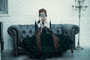 Rating: Safe Score: 0 Tags: 1girl brown_hair chair dress holding indoors long_hair sitting solo suiseiseki User: admin