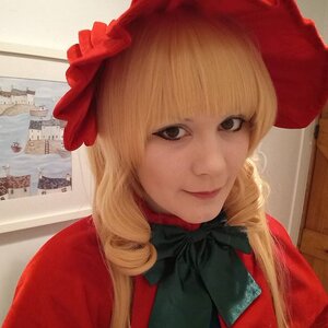 Rating: Safe Score: 0 Tags: 1girl bangs blonde_hair bow building closed_mouth hat long_hair looking_at_viewer portrait red_headwear shinku smile solo User: admin