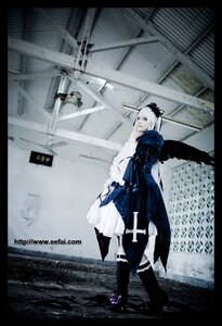 Rating: Safe Score: 0 Tags: 1girl black_border black_footwear boots cape cloak gloves letterboxed solo standing suigintou weapon User: admin