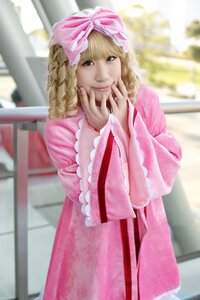 Rating: Safe Score: 0 Tags: 1girl 3d blonde_hair blurry blurry_background blurry_foreground bow day depth_of_field dress frills hair_bow hinaichigo long_sleeves looking_at_viewer outdoors photo photorealistic pink_bow pink_dress pink_ribbon railing realistic smile solo wide_sleeves User: admin