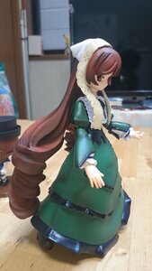 Rating: Safe Score: 0 Tags: 1girl bag brown_eyes brown_hair doll dress drill_hair full_body green_dress head_scarf long_hair long_sleeves solo standing suiseiseki very_long_hair User: admin