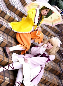 Rating: Safe Score: 0 Tags: 2girls animal_ears blonde_hair dress fox_ears fox_tail multiple_cosplay multiple_girls pavement short_hair sitting stairs tagme tail umbrella wide_sleeves yakumo_ran User: admin