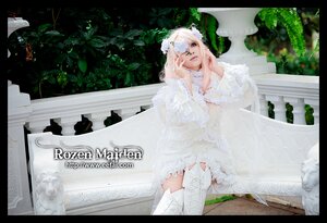 Rating: Safe Score: 0 Tags: 1girl dress kirakishou letterboxed sitting solo thighhighs veil wedding_dress white_dress white_hair User: admin