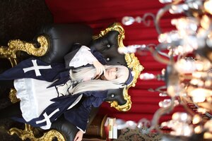 Rating: Safe Score: 0 Tags: 1girl black_dress blurry blurry_background blurry_foreground depth_of_field dress flower frills hairband long_hair long_sleeves looking_at_viewer sitting solo suigintou white_hair User: admin