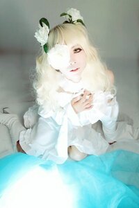 Rating: Safe Score: 0 Tags: 1girl bangs blonde_hair dress hair_ornament hair_over_one_eye kirakishou lips long_sleeves looking_at_viewer monster_girl navel realistic sitting solo User: admin