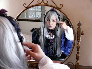 Rating: Safe Score: 0 Tags: 1girl dress flower frills hairband lips long_hair long_sleeves out_of_frame rose silver_hair solo solo_focus suigintou User: admin