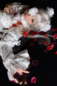 Rating: Safe Score: 0 Tags: 1girl blue_eyes closed_mouth dress fingerless_gloves fingernails flower gloves hair_ornament kirakishou lips long_hair looking_at_viewer outstretched_hand petals rose solo User: admin