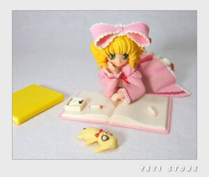 Rating: Safe Score: 0 Tags: 1girl blonde_hair blurry blurry_foreground bow depth_of_field doll dress frills green_eyes hina_ichigo hinaichigo long_sleeves photo pink_bow pink_dress short_hair solo User: admin