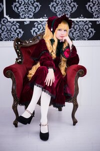 Rating: Safe Score: 0 Tags: 1girl armchair blonde_hair blue_eyes bonnet chair crossed_legs dress flower lolita_fashion long_hair pantyhose red_dress shinku shoes sitting solo white_legwear User: admin