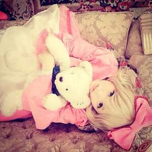 Rating: Safe Score: 0 Tags: 1girl blonde_hair blue_eyes book bow doll hair_bow hina_ichigo hinaichigo lying short_hair solo stuffed_animal teddy_bear User: admin