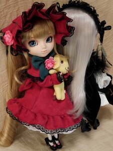 Rating: Safe Score: 0 Tags: 1girl blonde_hair blue_eyes bonnet bow dog doll dress flower long_hair red_dress rose shinku shoes sitting solo User: admin