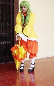 Rating: Safe Score: 0 Tags: 1girl closed_eyes closed_umbrella dress full_body green_hair kanaria long_hair mary_janes rain shoes solo standing umbrella User: admin