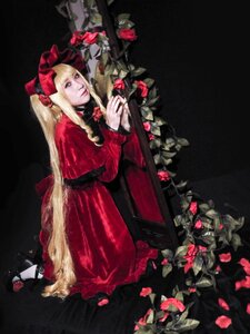 Rating: Safe Score: 0 Tags: 1girl black_background blonde_hair blue_eyes bow capelet dress flower lips long_hair looking_at_viewer petals red_dress red_flower rose shinku solo very_long_hair User: admin