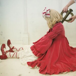 Rating: Safe Score: 0 Tags: 1girl blonde_hair bow dress frills hair_bow long_sleeves out_of_frame red_dress ribbon shinku sitting solo User: admin