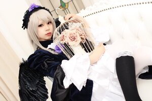 Rating: Safe Score: 0 Tags: 1girl 3d black_wings dress feathered_wings feathers frills lips long_hair long_sleeves looking_at_viewer red_eyes sitting solo suigintou wings User: admin