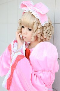 Rating: Safe Score: 0 Tags: 1girl bangs blonde_hair bow chin_rest dress frills hair_bow hinaichigo lips long_sleeves looking_at_viewer nose pink_dress realistic ribbon solo striped upper_body User: admin
