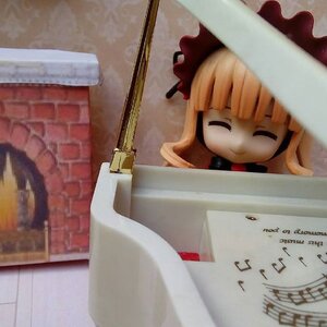 Rating: Safe Score: 0 Tags: 1girl bangs blonde_hair blunt_bangs closed_eyes doll eighth_note hat musical_note photo shinku smile solo User: admin