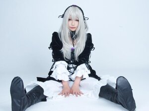 Rating: Safe Score: 0 Tags: 1girl black_dress blue_background dress frills gothic_lolita hairband lips long_hair long_sleeves looking_at_viewer red_eyes sitting solo suigintou User: admin