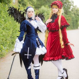 Rating: Safe Score: 0 Tags: 2girls blonde_hair bonnet dress hairband long_hair long_sleeves multiple_cosplay multiple_girls pantyhose photo realistic standing suigintou sword tagme weapon white_legwear wings User: admin