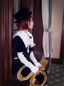 Rating: Safe Score: 0 Tags: 1girl brown_eyes brown_hair chair curtains dress hat indoors long_sleeves profile short_hair sitting solo souseiseki window User: admin