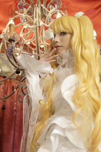 Rating: Safe Score: 0 Tags: 1girl blonde_hair curtains dress flower hair_ornament kirakishou lips long_hair realistic solo User: admin