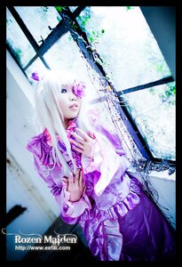 Rating: Safe Score: 0 Tags: 1girl barasuishou black_border blonde_hair blue_eyes dress flower hair_flower hair_ornament letterboxed long_hair long_sleeves pillarboxed purple_dress solo window User: admin