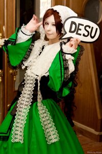 Rating: Safe Score: 0 Tags: 1girl brown_eyes brown_hair dress frills green_dress head_scarf long_sleeves sitting solo suiseiseki User: admin