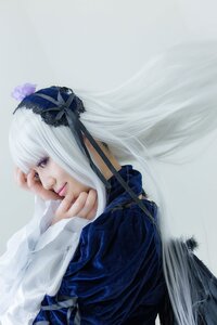 Rating: Safe Score: 0 Tags: 1girl bangs closed_mouth eyelashes flower hair_flower hair_ornament lips long_hair long_sleeves nose profile realistic solo suigintou upper_body white_hair User: admin