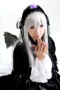 Rating: Safe Score: 0 Tags: 1girl auto_tagged black_dress black_ribbon black_wings closed_mouth dress feathered_wings feathers finger_to_mouth gothic_lolita lips lolita_fashion long_hair long_sleeves looking_at_viewer ribbon silver_hair solo suigintou upper_body wings User: admin