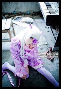 Rating: Safe Score: 0 Tags: 1girl barasuishou black_border blue_eyes blurry dress flower hair_flower hair_ornament letterboxed long_hair pillarboxed sitting solo white_hair User: admin
