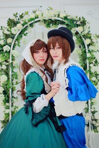 Rating: Safe Score: 0 Tags: 2girls blue_dress brown_hair dress green_dress hat holding_hands lips long_hair long_sleeves looking_at_viewer multiple_cosplay multiple_girls plant short_hair siblings sisters souseiseki suiseiseki tagme twins User: admin