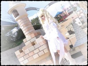 Rating: Safe Score: 0 Tags: 1girl blonde_hair border building day dress kirakishou letterboxed long_hair pillarboxed solo standing white_dress User: admin