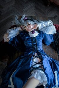 Rating: Safe Score: 0 Tags: 1girl dress frills lips long_hair long_sleeves lying on_back solo suigintou yellow_eyes User: admin
