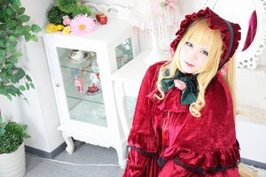 Rating: Safe Score: 0 Tags: 1girl blonde_hair blue_eyes bonnet bow curtains dress flower long_hair looking_at_viewer plant red_capelet red_dress shinku solo window User: admin