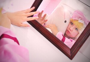 Rating: Safe Score: 0 Tags: 1girl blonde_hair blurry blurry_foreground depth_of_field hat hinaichigo mob_cap photo ribbon solo stuffed_animal yakumo_yukari User: admin